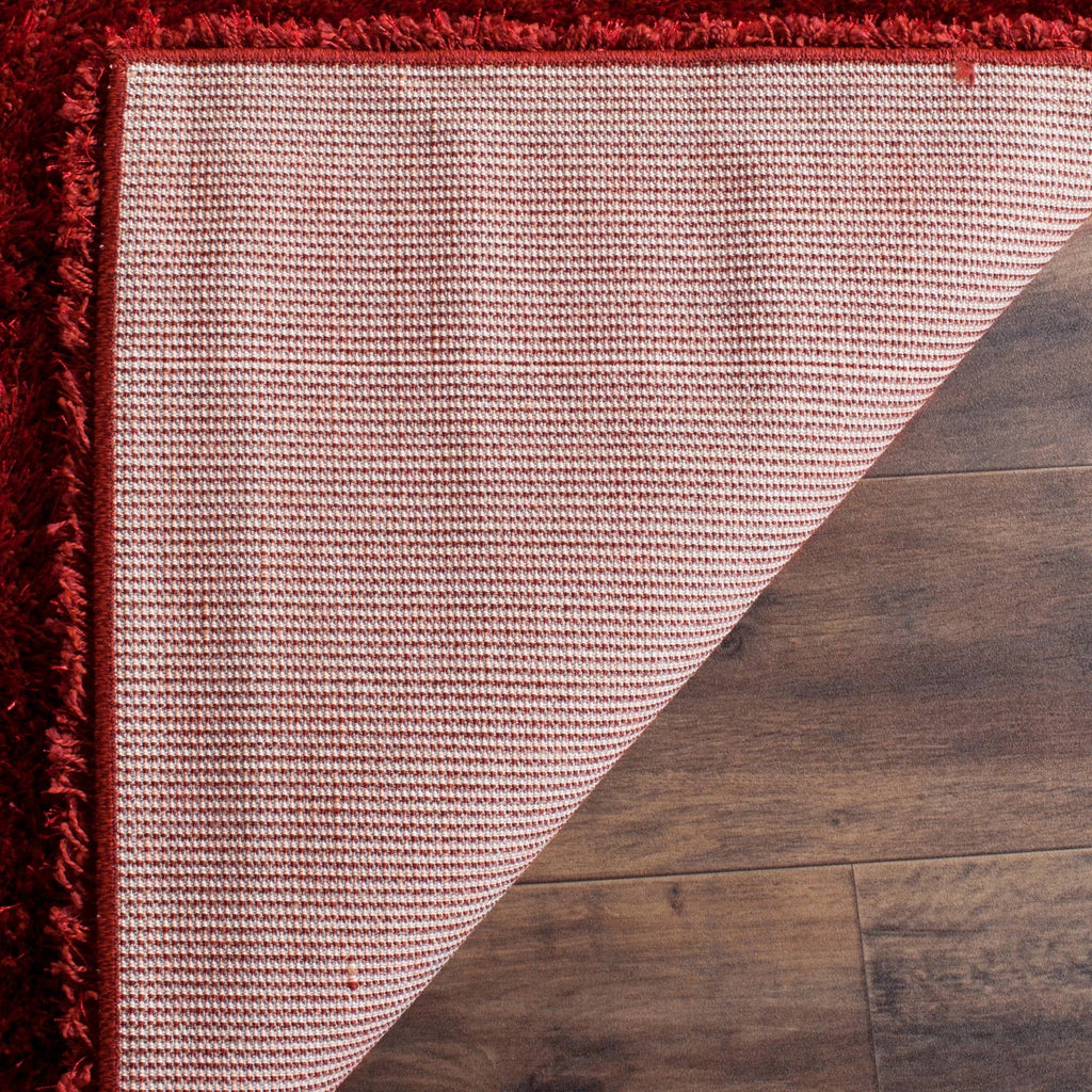 SAFAVIEH Charlotte Solid Plush Shag Area Rug, Red, 8' x 10'